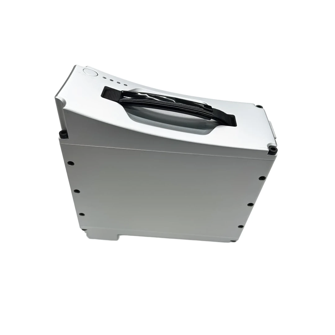 Unitree H2 Battery Three-Quarter View Unitree H2 battery three-quarter view showing the silver 972Wh quick-release pack with carry handle, charge-level LEDs and power button on a white background